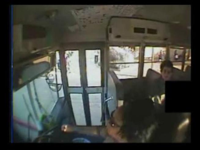 A school bus driver is accused of choking and spanking a student who says he taunted her