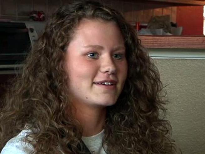 Members of the crowd saved the life of a high school athlete who collapsed on the court.