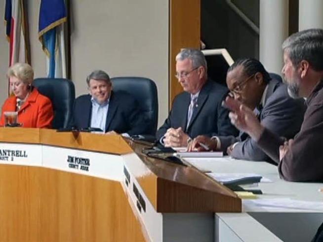County commissioners vote down a controversial buyout for their legal adviser in a special meeting.