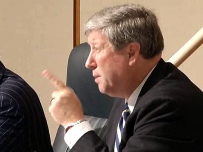 Dallas County Commissioners traded accusations as they went through with public safety layoffs to balanace their budget.
