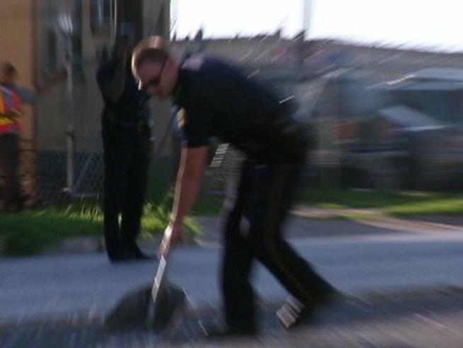More than $1,500 worth of quarters rained on a Dallas street Thursday after the back door of a Loomis armored truck car opened after it hit a bump.