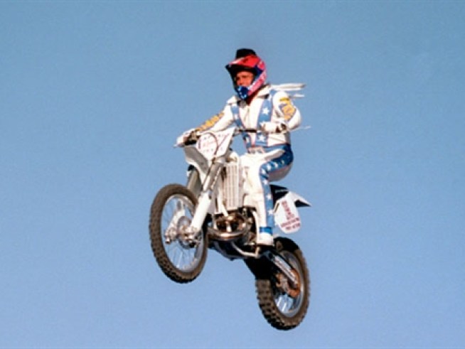 Robbie Knievel jumped 2 semi-trucks in downtown Austin Friday night before a crowd of 200,000.