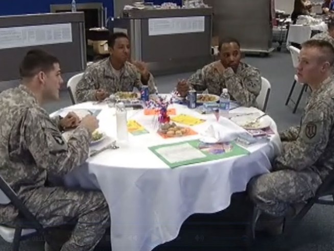 Volunteers take time out of their holiday to serve soliders ready to deploy.