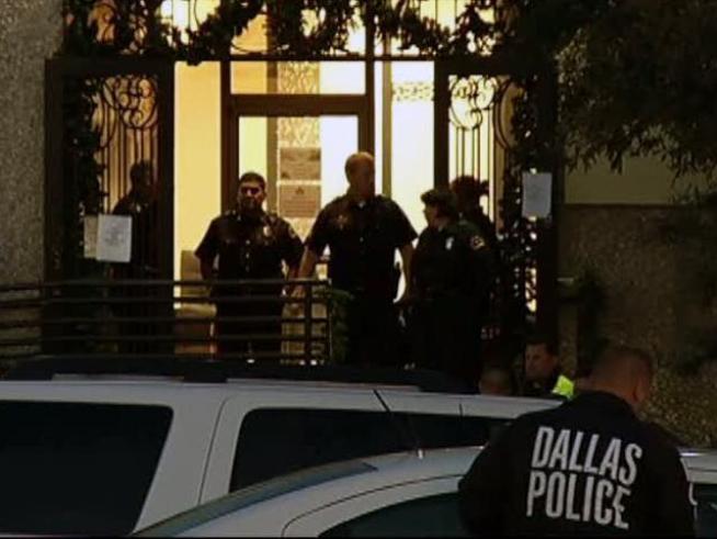 Police say the man's gun may have accidentally gone off during a struggle with officers serving him an arrest warrant.
