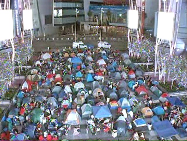Why would people travel 2,500 miles for a movie premiere they can't attend?