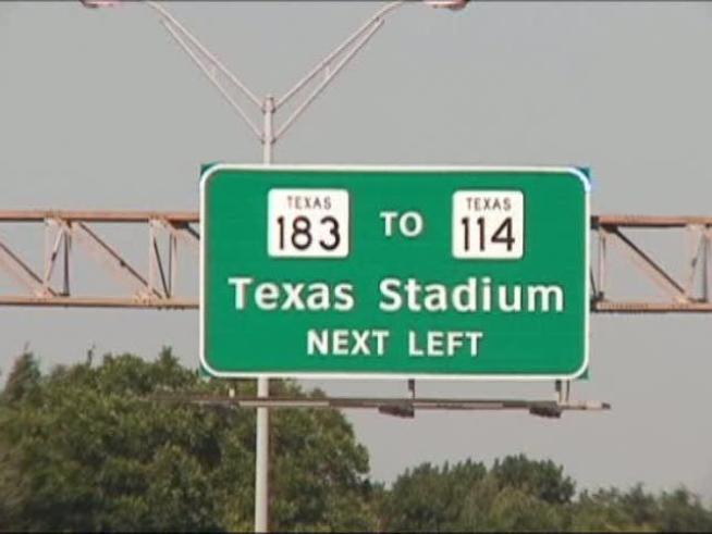 Many large signs directing drivers to where <a title=