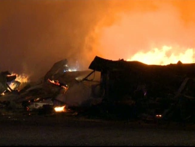 A warehouse fire left several structures destroyed in an industrial area.