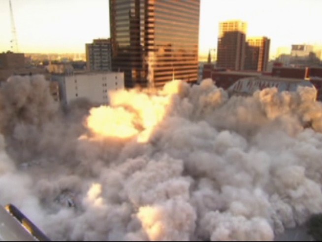 Spectators head downtown to watch the implosion of First Baptist <a title=