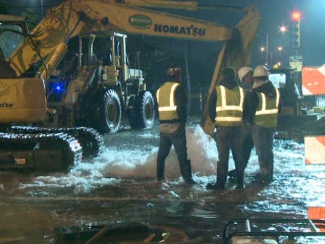 Crews digging a new water main accidentally struck the old one near <a title=