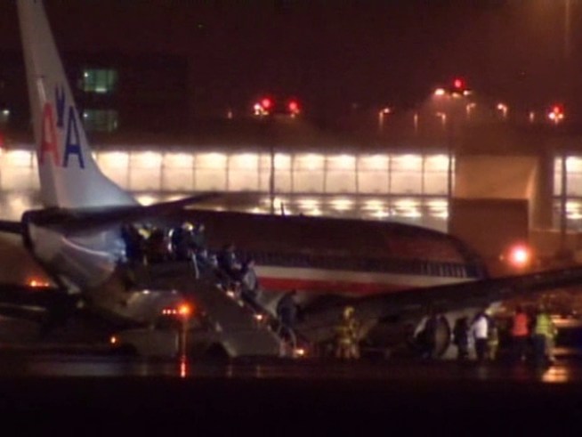 RAW VIDEO: A flight from DFW Airport slides off a Montreal runway in bad weather.