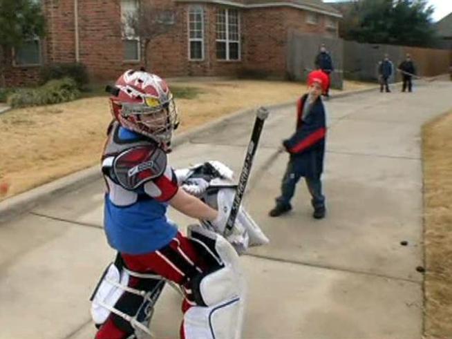 A group of 9-year-olds are competing in the a hockey tournament in <a title=