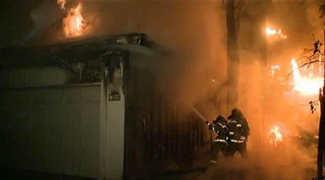 Four Dallas firefighters were treated for heat exhaustion after battling an overnight apartment fire.