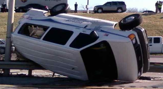 Prisoner Van Rolls Over on Loop 820