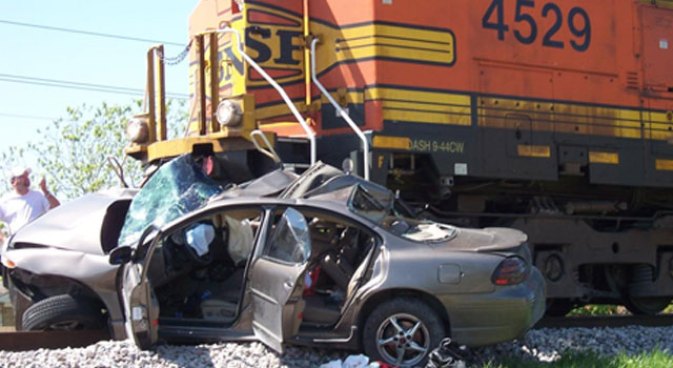 Driver Trying to Beat Train Doesn't