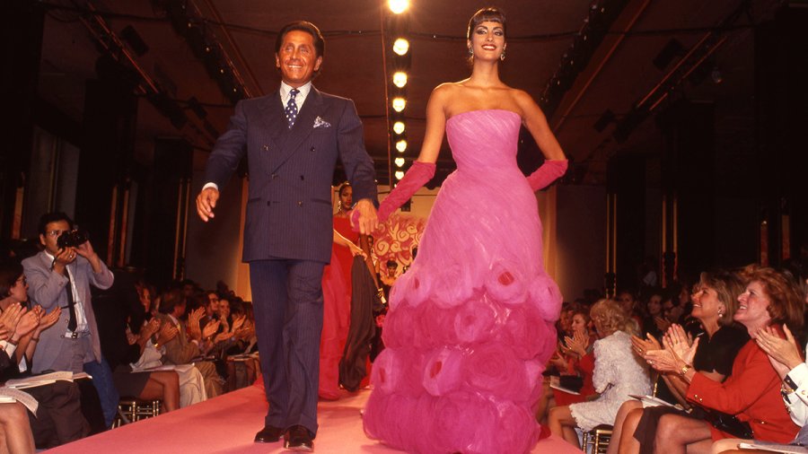 Italian fashion designer Valentino Garavani with model Yasmeen Ghauri during his Fall Winter 1991-1992 fashion show.  