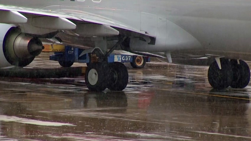 052514 Rain American Airline plane DFW airport