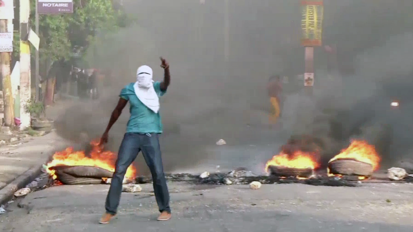 070718 Haiti Protest Fire