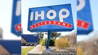 A blue sign with the letters "IHOP" in white