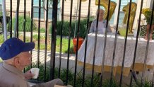 Betty and James Heaslet celebrate their 71st anniversary at a distance. The family credits the staff at Betty's memory care center for making the day as special as possible.