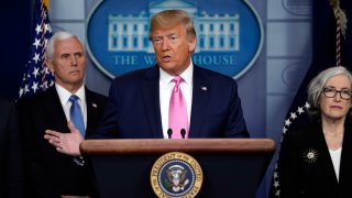 President Donald Trump with members of the President's Coronavirus Task Force speaks during a news conference in the Brady Press Briefing Room of the White House, Wednesday, Feb. 26, 2020, in Washington.