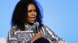 In this Dec. 12, 2019, file photo, former U.S. fist lady Michelle Obama speaks during an event for Obama Foundation in Kuala Lumpur, Malaysia.