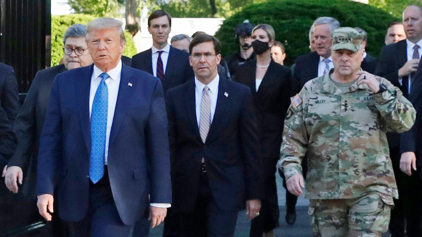 In this June 1, 2020 file photo, President Donald Trump departs the White House to visit outside St. John's Church, in Washington. Part of the church was set on fire during protests on Sunday night. Walking behind Trump from left are, Attorney General William Barr, Secretary of Defense Mark Esper and Gen. Mark Milley, chairman of the Joint Chiefs of Staff.