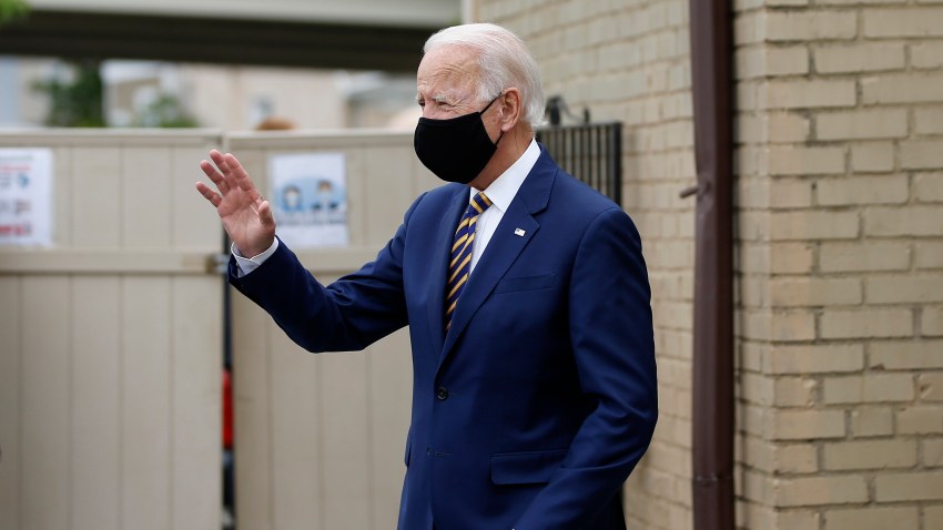 Democratic presidential candidate, former Vice President Joe Biden waves as he arrives to meet with with small business owners, Wednesday, June 17, 2020, at Carlette's Hideaway, a soul food restaurant, in Yeadon, Pa.