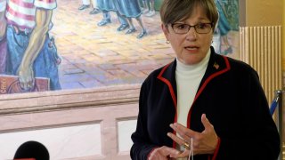 Kansas Gov. Laura Kelly answers questions from reporters about the coronavirus pandemic after a meeting with legislative leaders, Thursday, July 2, 2020, at the Statehouse in Topeka, Kan. Kelly has issued an order to require people to wear masks in public and at their workplaces.