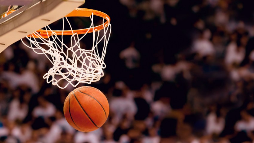 Scoring the winning points at a basketball game