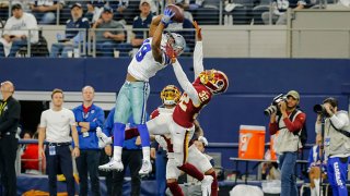 Dallas Cowboys wide receiver Amari Cooper (19) catches a pass for a first down over Washington Redskins cornerback Jimmy Moreland (32) during the game between the Dallas Cowboys and the Washington Redskins on December 29, 2019 at AT&T Stadium in Arlington, Texas.