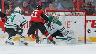 Artem Anisimov #51 of the Ottawa Senators scores the overtime winning goal against Anton Khudobin #35 and Roope Hintz #24 of the Dallas Stars at Canadian Tire Centre on Feb. 16, 2020 in Ottawa, Ontario, Canada.