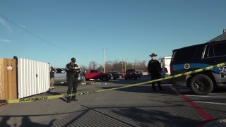 Authorities respond to the scene of a shooting in the 6300 block of Baker Boulevard Sunday, Dec. 15, 2019 in Haltom City, Texas.