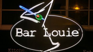 The entrance to Bar Louie is viewed on March 26, 2013, in Chicago, Illinois. Visitors to "The Windy City," the third most populous city in the United States, have had to bundle up due to an unusually cold spring.