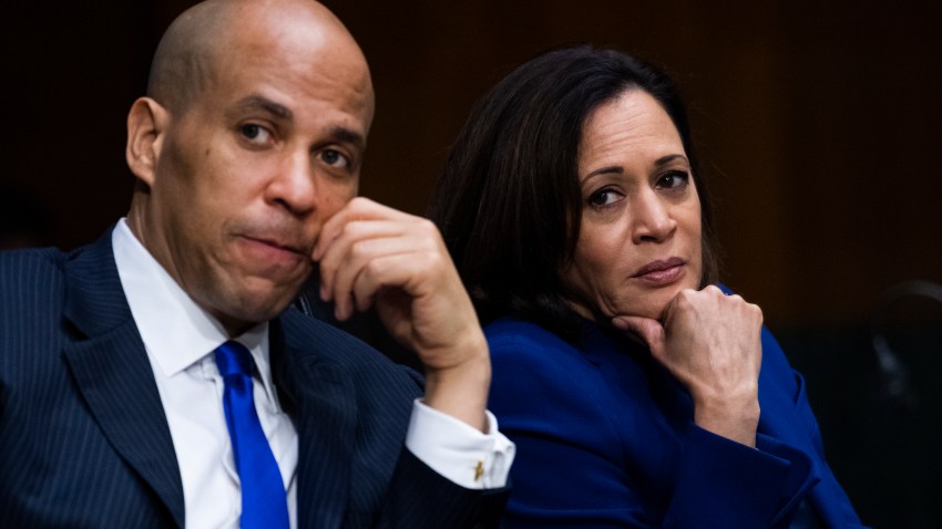 Sen. Cory Booker, D- N.J., and listen Sen. Kamala Harris, D-Calif., during a Senate Judiciary Committee hearing on police use of force and community relations on on Capitol Hill, Tuesday, June 16, 2020 in Washington.