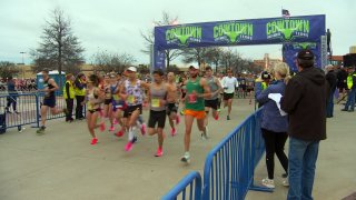 Runners made their way to the starting line of the 42nd annual Cowtown Marathon before dawn Sunday, each with a story of what brought them this far and what they hoped would carry them across the finish line.