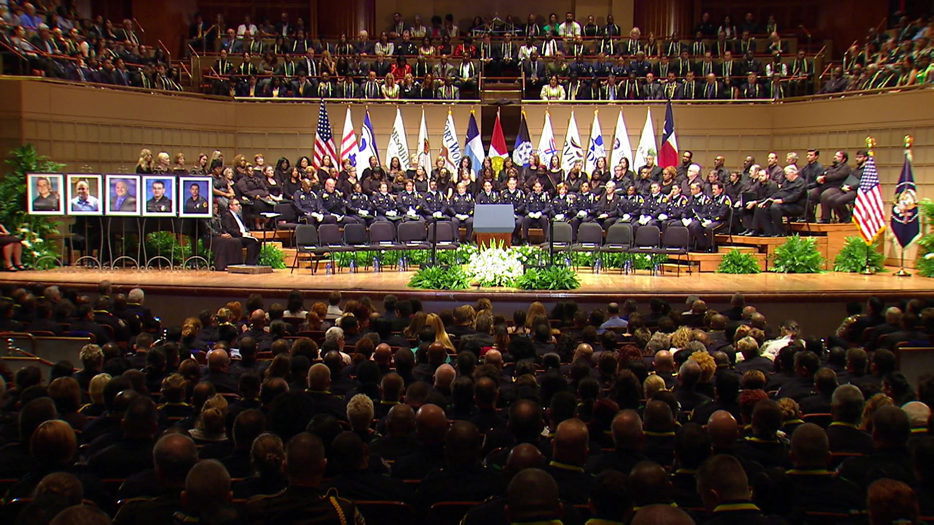 The Interfaith Memorial service is honoring the lives of five officers who were killed last Thursday night.