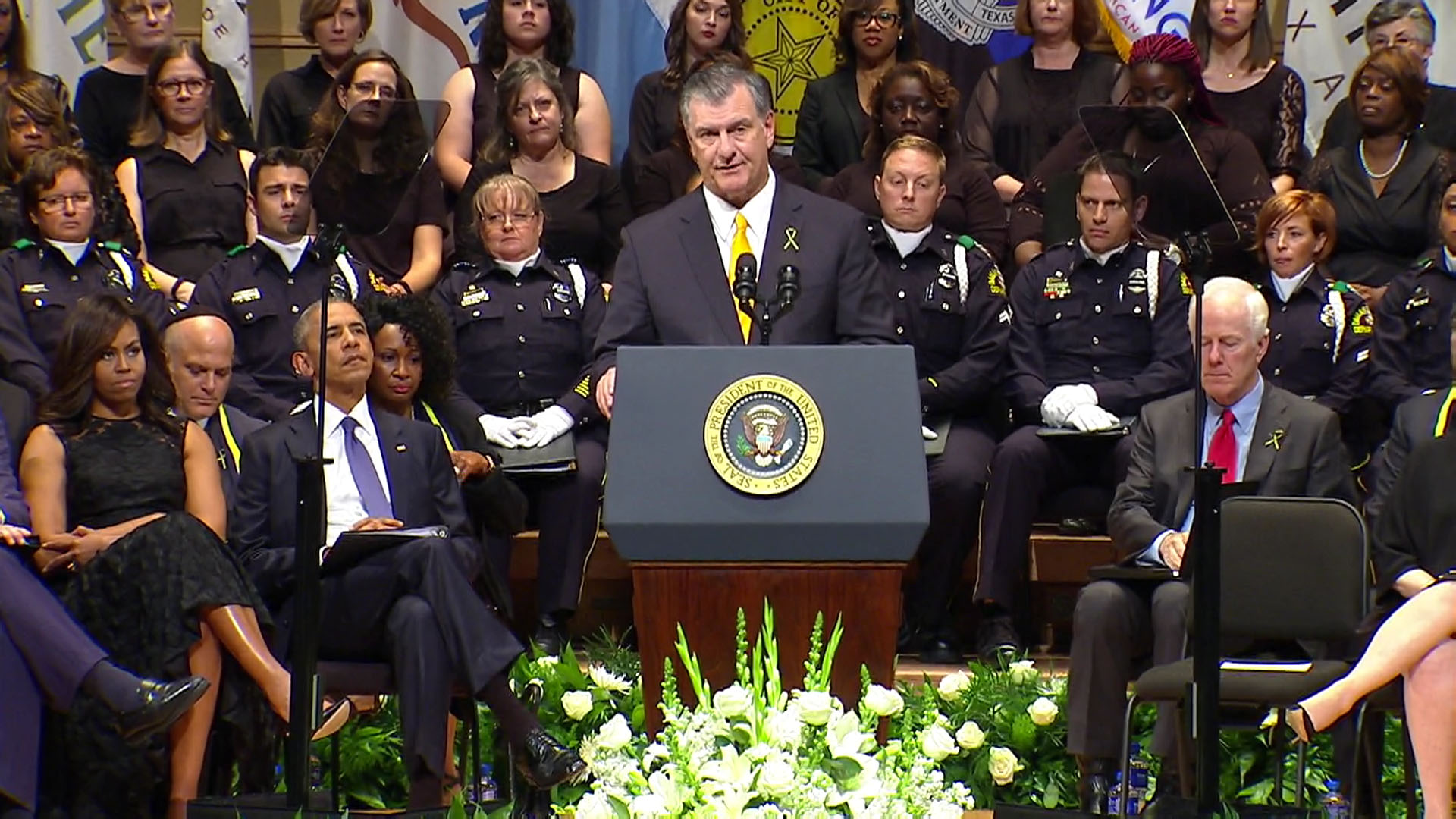 Dallas City Mayor Mike Rawlings speaks at the event.
