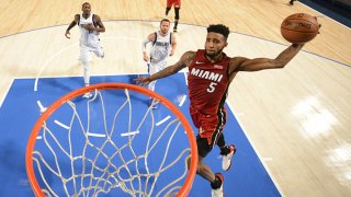 Derrick Jones Jr. #5 of the Miami Heat dunks the ball against the Dallas Mavericks on Dec. 14, 2019 at the American Airlines Center in Dallas, Texas.