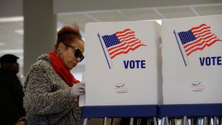 Andrea Anthory takes advantage of early voting, Friday, March 13, 2020, in Cleveland.