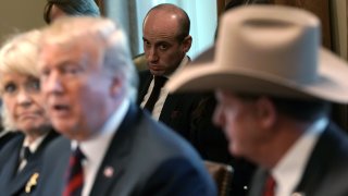 Senior Advisor to the President Stephen Miller (C) looks on as U.S. President Donald Trump hosts a round-table discussion on border security and safe communities with State, local, and community leaders in the Cabinet Room of the White House on January 11, 2019 in Washington, D.C.