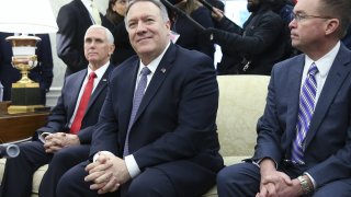 Vice President Mike Pence, from left, Mike Pompeo, U.S. secretary of state, and Mick Mulvaney, acting White House chief of staff, listen during a meeting with President Donald Trump and Mario Abdo Benitez, Paraguay’s president, not pictured, in the Oval Office of the White House in Washington, on Dec. 13, 2019.