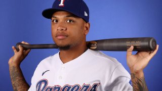 Willie Calhoun #5 of the Texas Rangers poses for a portrait during MLB media day on February 19, 2020 in Surprise, Arizona.