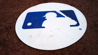 MLB Logo on the batting mat during the spring training game between the Toronto Blue Jays and the Minnesota Twins at TD Ballpark on February 27, 2020 in Dunedin, Florida.