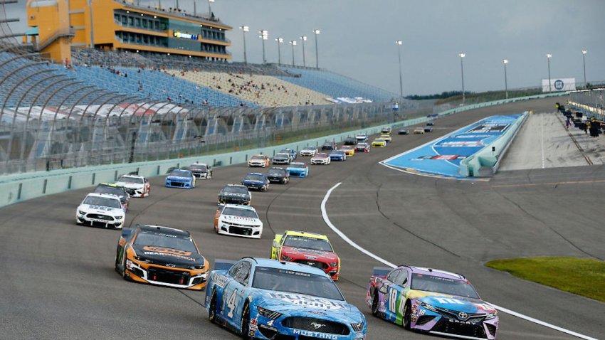 HOMESTEAD, FLORIDA – JUNE 14: Kevin Harvick, driver of the #4 Busch Light Ford, and Kyle Busch, driver of the #18 M&M’s Messages Toyota, lead the field during the NASCAR Cup Series Dixie Vodka 400 at Homestead-Miami Speedway on June 14, 2020 in Homestead, Florida. (Photo by Michael Reaves/Getty Images)