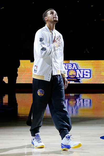OAKLAND, CA - OCTOBER 27: Stephen Curry #30 of the Golden State Warriors walks to receive his championship ring prior to their game against the New Orleans Pelicans in the NBA season opener at ORACLE Arena on October 27, 2015 in Oakland, California. NOTE TO USER: User expressly acknowledges and agrees that, by downloading and or using this photograph, User is consenting to the terms and conditions of the Getty Images License Agreement. (Photo by Ezra Shaw/Getty Images)