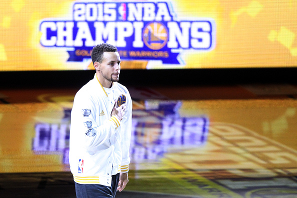 OAKLAND, CA - OCTOBER 27: Stephen Curry #30 of the Golden State Warriors walks to receive his championship ring prior to their game against the New Orleans Pelicans in the NBA season opener at ORACLE Arena on October 27, 2015 in Oakland, California. NOTE TO USER: User expressly acknowledges and agrees that, by downloading and or using this photograph, User is consenting to the terms and conditions of the Getty Images License Agreement. (Photo by Robert Reiners/Getty Images)