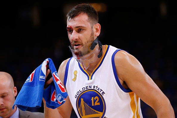OAKLAND, CA - OCTOBER 27: Andrew Bogut #12 of the Golden State Warriors walks off the court after being cut during the NBA season opener against the New Orleans Pelicans at ORACLE Arena on October 27, 2015 in Oakland, California. NOTE TO USER: User expressly acknowledges and agrees that, by downloading and or using this photograph, User is consenting to the terms and conditions of the Getty Images License Agreement. (Photo by Ezra Shaw/Getty Images)