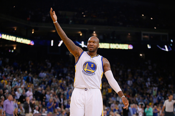 OAKLAND, CA - NOVEMBER 04: Marreese Speights #5 of the Golden State Warriors tries to get the crowd louder during their game against the Los Angeles Clippers at ORACLE Arena on November 4, 2015 in Oakland, California. NOTE TO USER: User expressly acknowledges and agrees that, by downloading and or using this photograph, User is consenting to the terms and conditions of the Getty Images License Agreement. (Photo by Ezra Shaw/Getty Images)