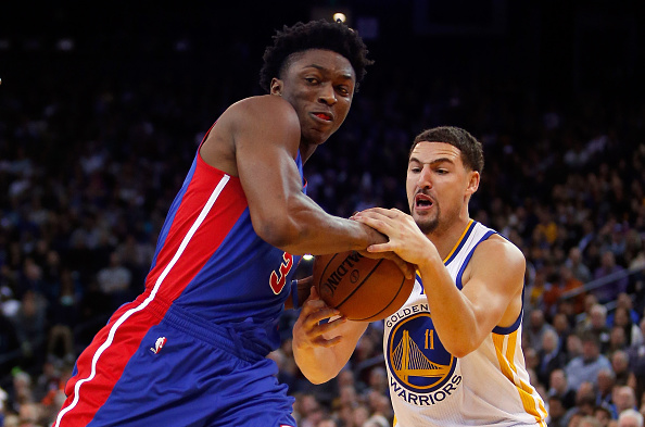 OAKLAND, CA - NOVEMBER 09: Stanley Johnson #3 of the Detroit Pistons and Klay Thompson #11 of the Golden State Warriors fight over the ball at ORACLE Arena on November 9, 2015 in Oakland, California. NOTE TO USER: User expressly acknowledges and agrees that, by downloading and or using this photograph, User is consenting to the terms and conditions of the Getty Images License Agreement. (Photo by Ezra Shaw/Getty Images)