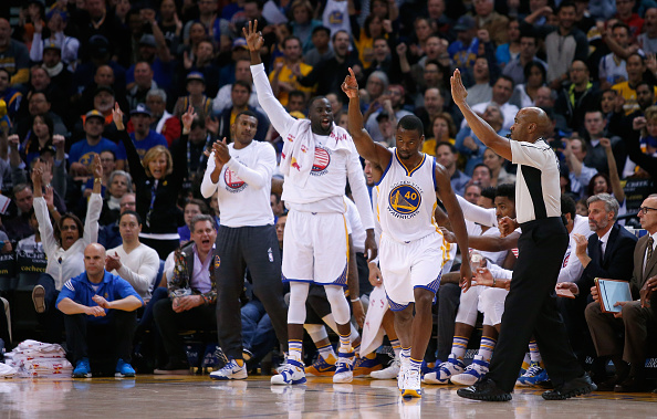 OAKLAND, CA - NOVEMBER 09: Harrison Barnes #40 of the Golden State Warriors reacts after making a three-point basket against the Detroit Pistons at ORACLE Arena on November 9, 2015 in Oakland, California. NOTE TO USER: User expressly acknowledges and agrees that, by downloading and or using this photograph, User is consenting to the terms and conditions of the Getty Images License Agreement. (Photo by Ezra Shaw/Getty Images)